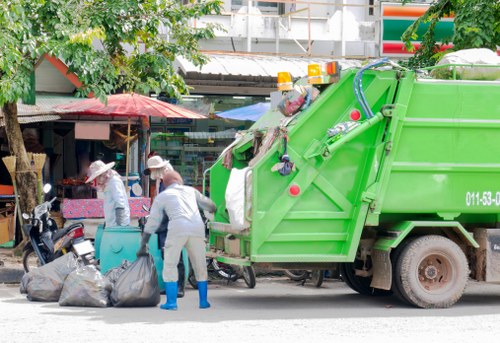 Professional waste removal service team at work